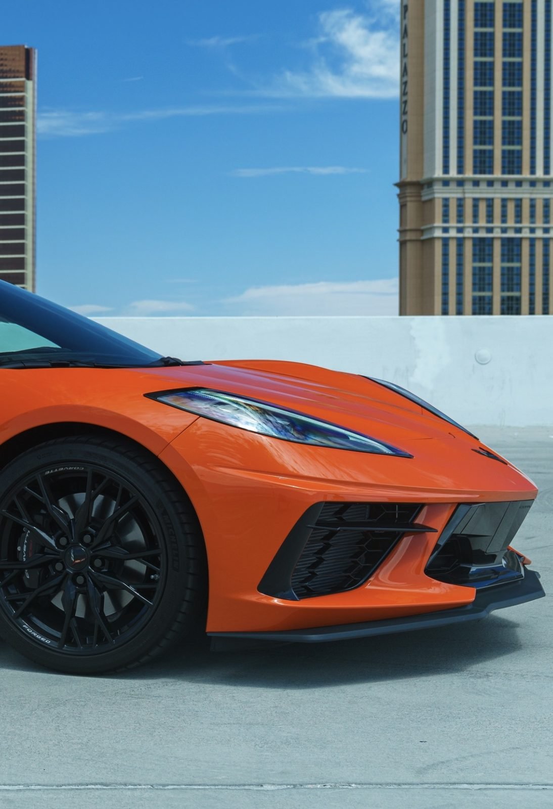 Orange Corvette C8 Stingray rental near The Palazzo on the Las Vegas Strip